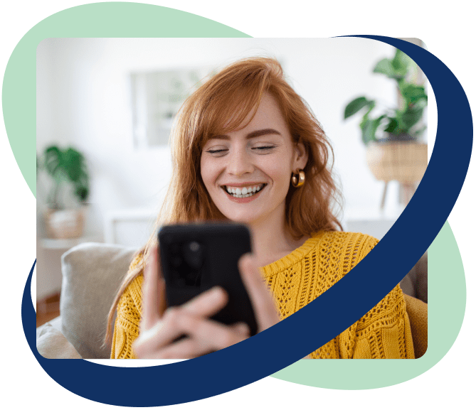 woman holding phone smiling